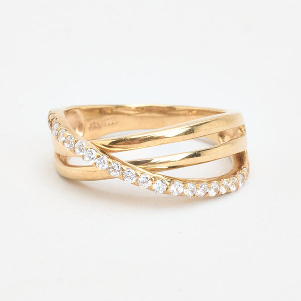 Crossoverring i 8K guld med en zirkonia strl. 17.2 / strl. 54