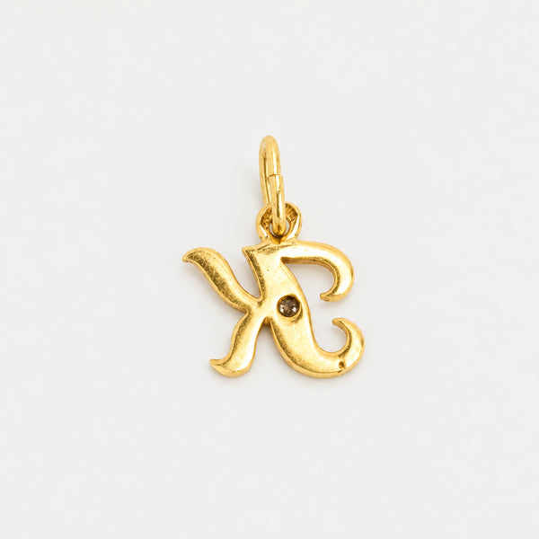 Bokstavshänge med diamant (0.01 ct) i 14K guld, 1.5 cm, 0.35 g