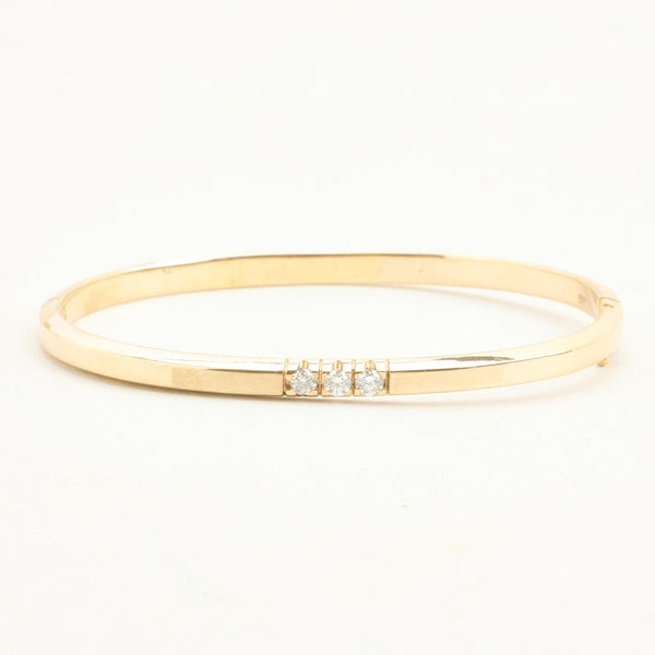 Klassisk armring med lås med diamant (0.3 ct) i 14K guld, 5.7 cm, 18.8 g