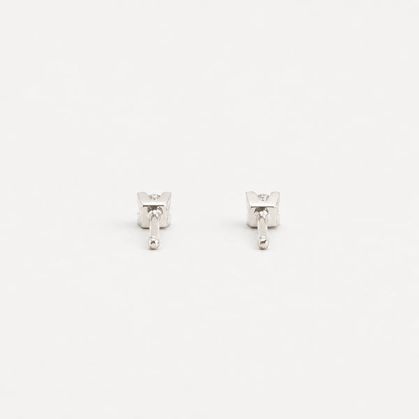 Solitär örhängen med diamant (0.11 ct) i 14K guld, 1 cm,