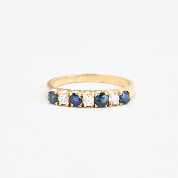 Alliansring med diamant (0.25 ct) i 14K guld med en safir strl. 19.1 / strl. 60