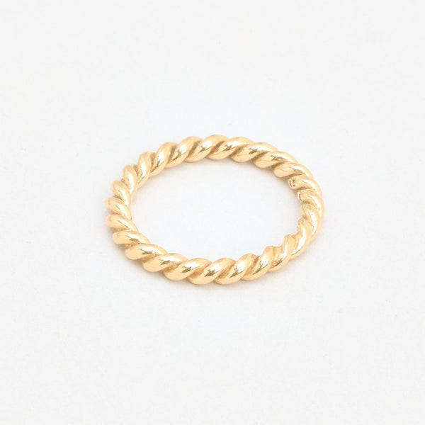 Vridna band i 14K guld strl. 16.9 / strl. 53