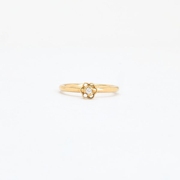 Spinning Blomsterring i 8K guld med en zirkonia strl. 16.9 / strl. 53