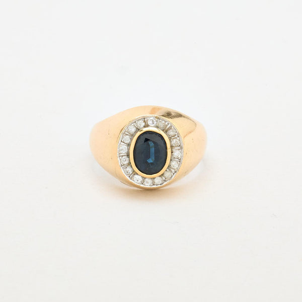 Klackring i 14K guld med en syntetisk safir och zirkonia strl. 20.1 / strl. 63