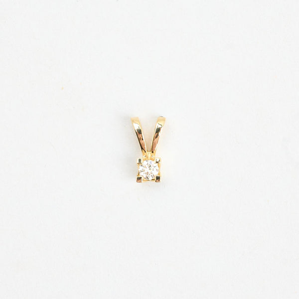 Klassisk solitärhänge med diamant i 14K guld, 1 cm, 0.6 g