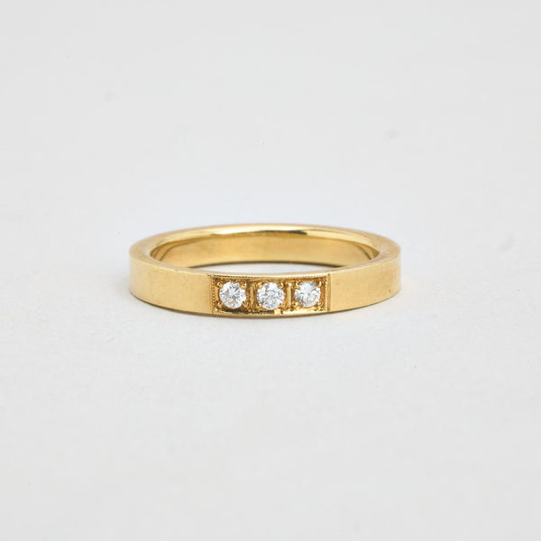 Alliansring med diamant (0.16 ct) i 14K guld strl. 16.9 / strl. 53