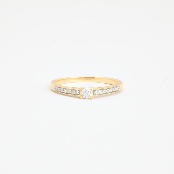 Allians solitärring med diamant (0.16 ct) i 14K guld strl. 17.5 / strl. 55