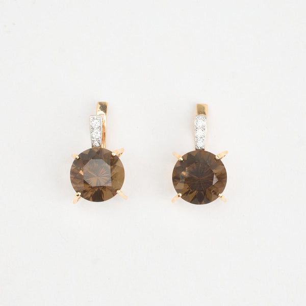 Örhängen med stift med diamant (0.13 ct) i 14K guld, 2.5 cm,